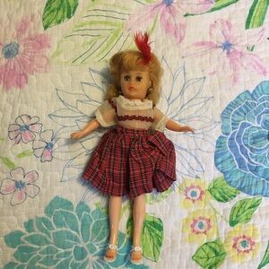 Vintage ‘50s teenage doll.  Original clothes, earrings and high heels.